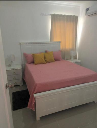 Ένα ή περισσότερα κρεβάτια σε δωμάτιο στο 3BR-2BA with Pool in La Romana! Dominican Republic