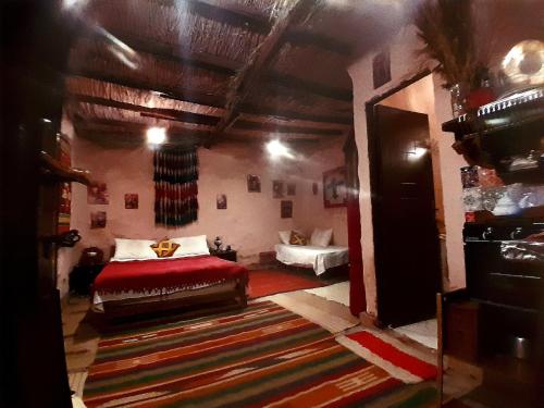Postel nebo postele na pokoji v ubytování Giza Oasis Ein Koudra