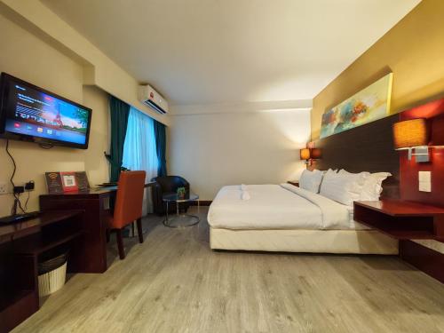 Katil atau katil-katil dalam bilik di Meetsuite at Ming Garden Residence