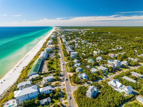 an aerial view of a beach with condos at Sand Pointe by 30A Escapes in Inlet Beach
