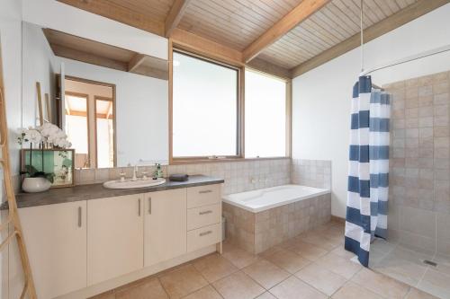 Et badeværelse på Garden Cottage - Somers