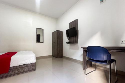 Μια τηλεόραση ή/και κέντρο ψυχαγωγίας στο RedDoorz Plus near Tembesi Batu Aji Batam
