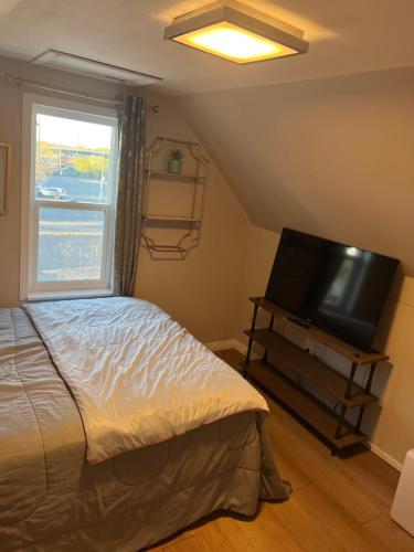 Ένα ή περισσότερα κρεβάτια σε δωμάτιο στο Lovely Loft Apartment