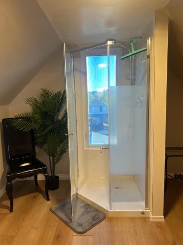 Μια τηλεόραση ή/και κέντρο ψυχαγωγίας στο Lovely Loft Apartment