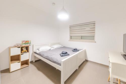 Cama o camas de una habitación en הבית