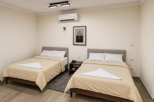 Cama ou camas em um quarto em 971. Modern Studio 2bed 1BA Kitchen