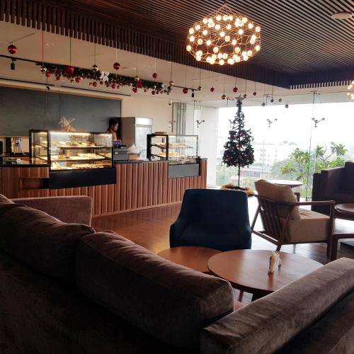 Un lugar para sentarse en Eden Heights by Property Boutique