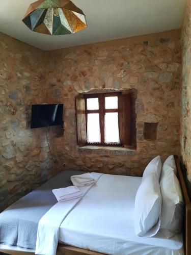 Postel nebo postele na pokoji v ubytování Casa Tsiliviani