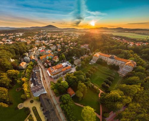an aerial view of a city at sunset at Dom Zdrojowy w Szczawnie - Zdroju in Szczawno-Zdrój