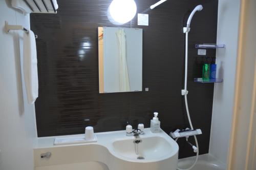 Koupelna v ubytování Ryokan Iwasawasou