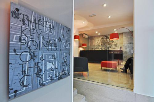 Кухня или мини-кухня в BB Hotels Aparthotel Visconti

