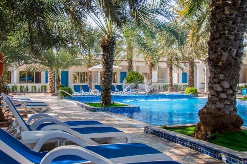Bazén v ubytování Fujairah Hotel & Resort nebo v jeho okolí