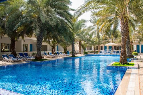 Bazén v ubytování Fujairah Hotel & Resort nebo v jeho okolí