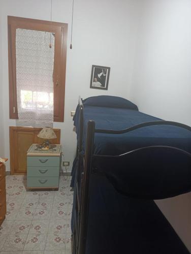Ένα ή περισσότερα κρεβάτια σε δωμάτιο στο Villa Aurora
