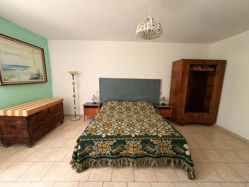 Postel nebo postele na pokoji v ubytování Casa in campagna a Rosciano