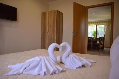 Katil atau katil-katil dalam bilik di Guest House ERIDA