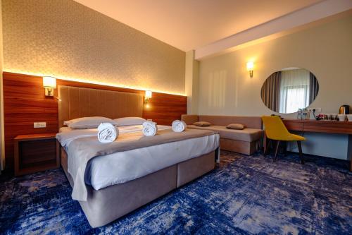 Postel nebo postele na pokoji v ubytování Hotel Ryon