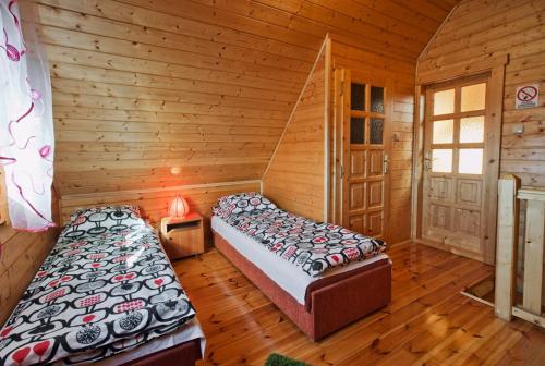 Postel nebo postele na pokoji v ubytování Dobre smaki at Wczasowa8 sea resort