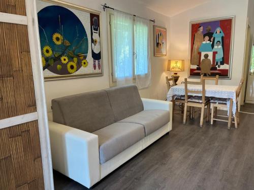 a living room with a couch and a table at Casa Bianca in Vaiano