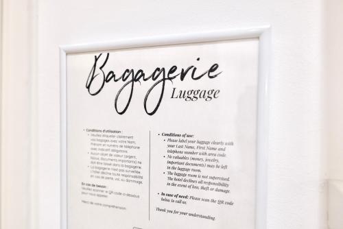 a picture of a white frame with a handwritten elegance invoice at Rhodania Boutique Hôtel in Geneva