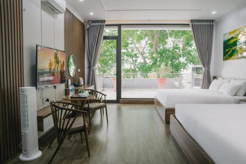 Ένα ή περισσότερα κρεβάτια σε δωμάτιο στο Tam Coc LiLy Homestay