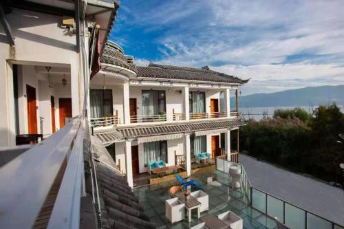 a view of a house from the balcony at Erhaike Seaview Inn in Dali