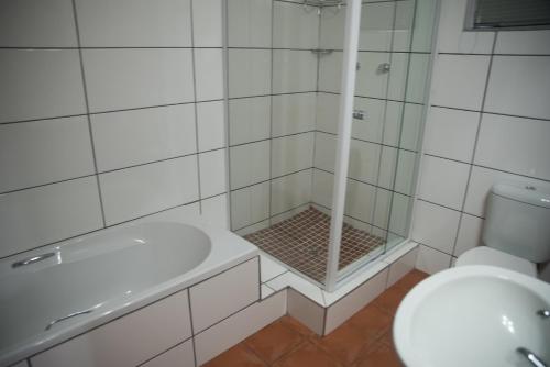 Koupelna v ubytování Beesdam Guesthouse