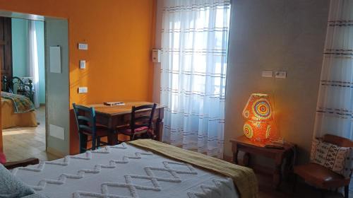 Ένα ή περισσότερα κρεβάτια σε δωμάτιο στο Namaste apartment Fiumelatte
