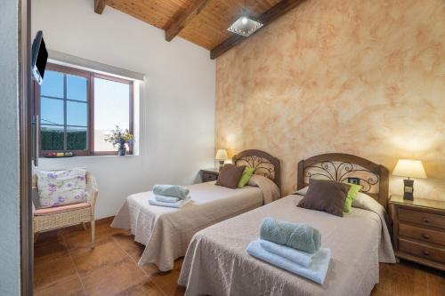 Ένα ή περισσότερα κρεβάτια σε δωμάτιο στο vv - La Casa Verde