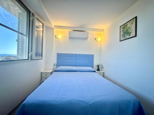 Ένα ή περισσότερα κρεβάτια σε δωμάτιο στο Sea View Joy Collection