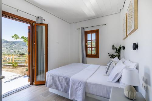 Ένα ή περισσότερα κρεβάτια σε δωμάτιο στο Astraea Holiday Home