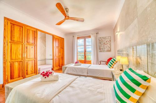 Ένα ή περισσότερα κρεβάτια σε δωμάτιο στο Ideal Property Mallorca - Son Tomasset