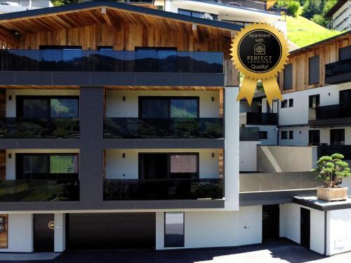 a building with a sign on the side of it at Seven Reasons / Panorama View in Hart im Zillertal