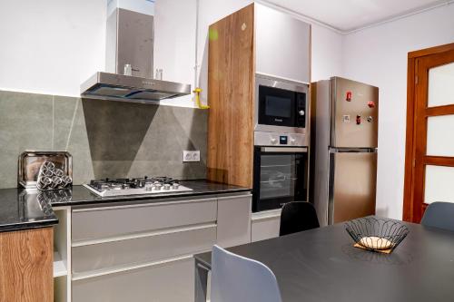 Η κουζίνα ή μικρή κουζίνα στο Prestige Home Confort & Élégance