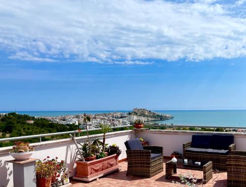 a balcony with a view of the ocean at Dreaming Penthouse in Vieste