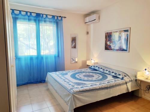 Postel nebo postele na pokoji v ubytování Blue House