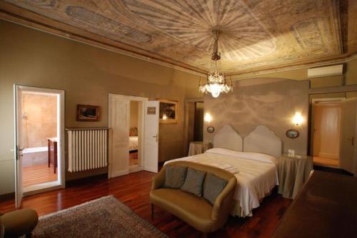 Ένα ή περισσότερα κρεβάτια σε δωμάτιο στο Cà Satriano