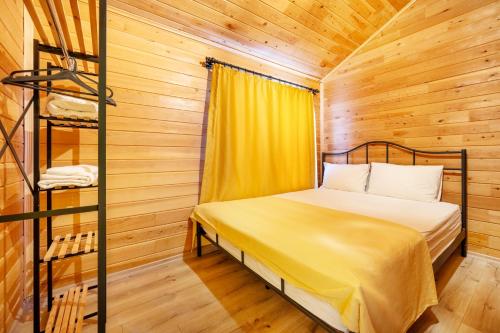 Postel nebo postele na pokoji v ubytování Izgen Bungalows
