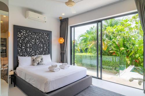 Voodi või voodid majutusasutuse Tropical 2br Villa Luna Private Pool In Bophut toas