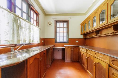 Kuchyň nebo kuchyňský kout v ubytování T Cherry Villa by Le Montfort Resort