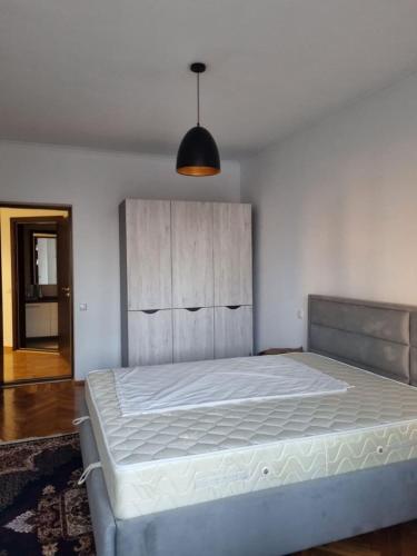 a bedroom with a large bed in a room at House of Westeros - OldTown in Chişinău