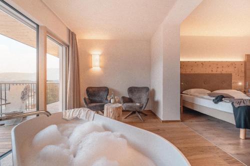 Posezení v ubytování Cristallo Sport & Wellness Hotel