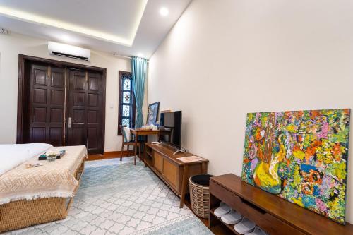 TV/Unterhaltungsangebot in der Unterkunft Nguyen Le Home - Nguyen Dinh Chieu, District 1
