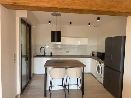 Η κουζίνα ή μικρή κουζίνα στο Maison proche des plages