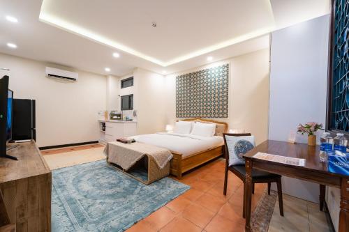 Ein Bett oder Betten in einem Zimmer der Unterkunft Nguyen Le Home - Nguyen Dinh Chieu, District 1