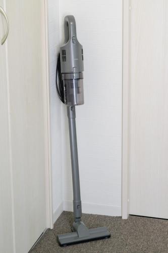 a camera is standing next to a wall at LudiCent717 - Vacation STAY 08169v in Toyohira