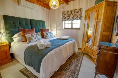 Ένα ή περισσότερα κρεβάτια σε δωμάτιο στο Nassau Guest Farm