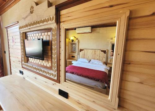 Katil atau katil-katil dalam bilik di Saruhan Hotel