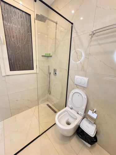 Bilik mandi di Belix Hotel Apartments, Near the Beach