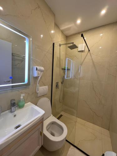 Bilik mandi di Belix Hotel Apartments, Near the Beach